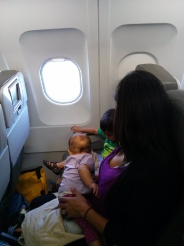 Next flight wasn't so smooth. Fatigue was wrecking mama. She didn't sleep this time either. Since Julie was awake, she fussed because her ears hurt. She didn't want to nurse. A lady tapped me on the shoulder, "Do you have a pacifier? It's her ears." I said, "She's breastfeeding." 