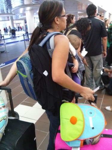Mama + J2 + J's doggie backpack + diaper backpack + 2 suitcases