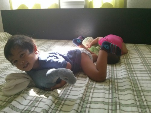 Just waking up - you plopped so J laughed and plopped too. He had his dino so he brought you the frog.