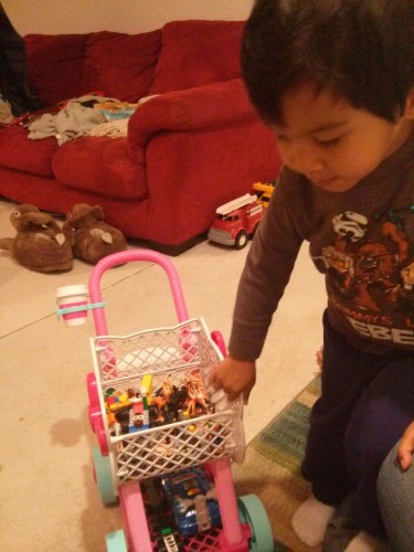 Stealing sister's cart (gift from auntie J)